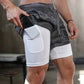 The image shows a close-up of a man wearing 2-in-1 gym sports shorts with a camouflage-patterned outer layer and a white compression inner layer. The inner layer features a side pocket, and the man is placing a smartphone into this pocket. The pocket is snug and designed to securely hold a phone or other small items during workouts. The shorts also have a drawstring waistband for adjustable comfort, making them functional and practical for athletic activities. The setting appears to be in a gym or workout s