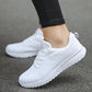 Women's breathable mesh sneakers in classic white, offering both style and comfort. Perfect for casual wear, running, or fitness activities, these shoes ensure maximum airflow.