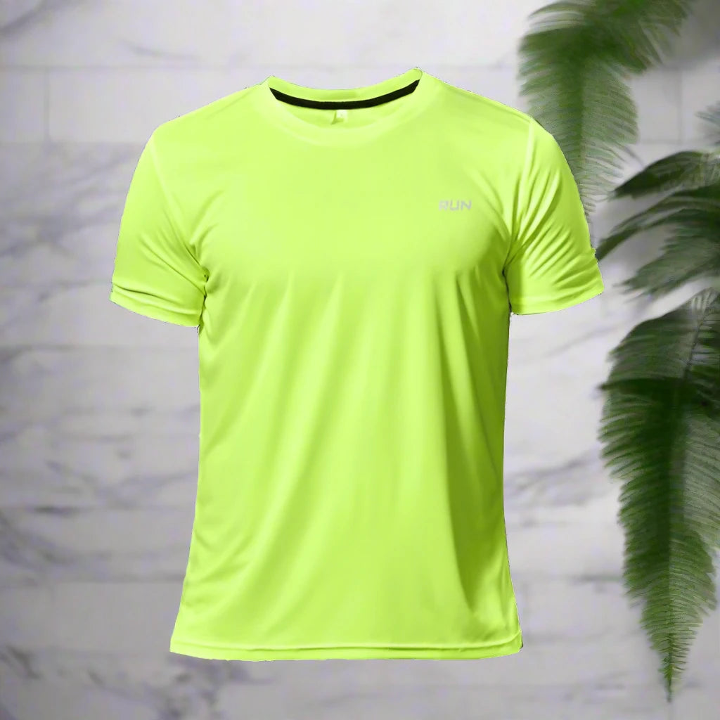 Bright green polyester running T-shirt with 'RUN' text, displayed against a marble wall background with greenery.