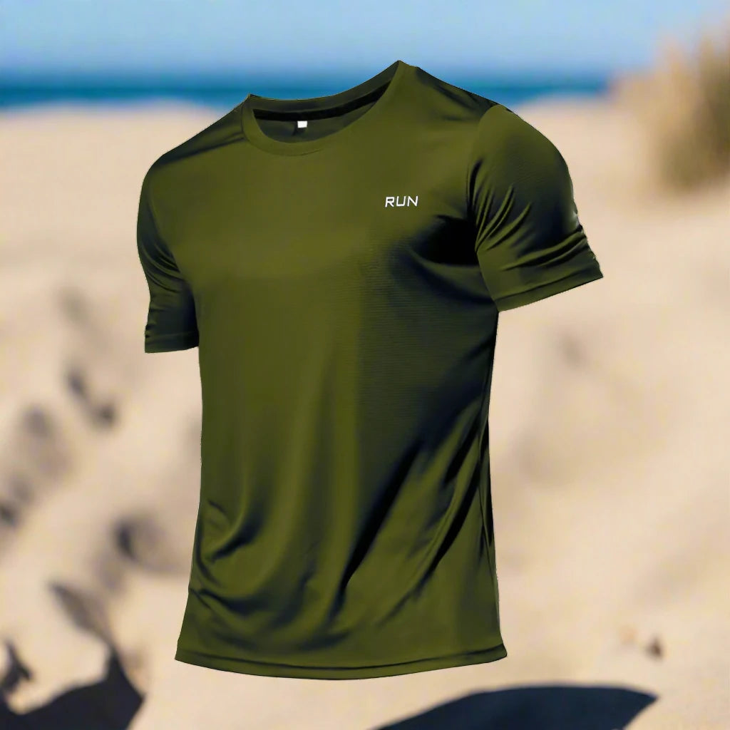 Army green polyester running T-shirt with 'RUN' text, designed for high performance and comfort, displayed on a sandy beach background.