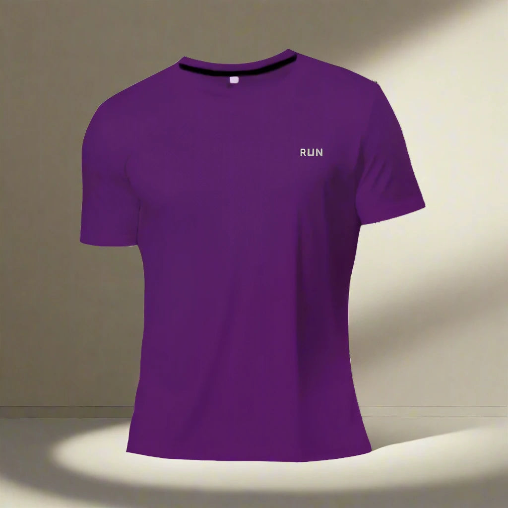 Purple polyester running T-shirt with 'RUN' text, displayed against a minimal light and shadow backdrop