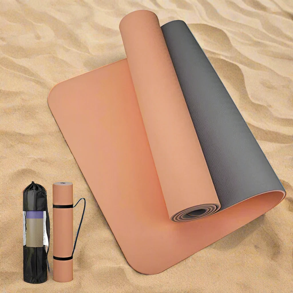 Peach-colored high-quality yoga mat with a dark anti-slip backing, featuring a matching carrying case, designed for comfort, durability, and versatile workouts.