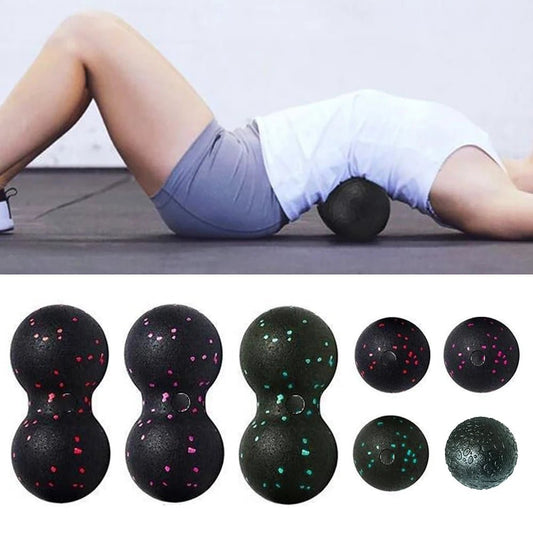 Set of lightweight massage balls in various sizes and colors, used for muscle relaxation and tension release, ideal for back and full-body recovery exercises.