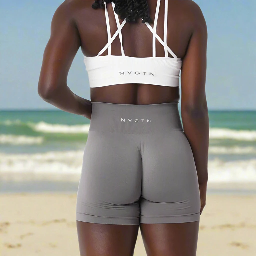 These grey high-waisted fitness shorts offer a sleek, supportive fit, ideal for both workouts and casual outings. Designed for comfort and style, they provide excellent mobility.