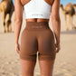 These brown high-waisted fitness shorts offer a comfortable and supportive fit, perfect for workouts or everyday wear. The seamless design ensures flexibility and style.