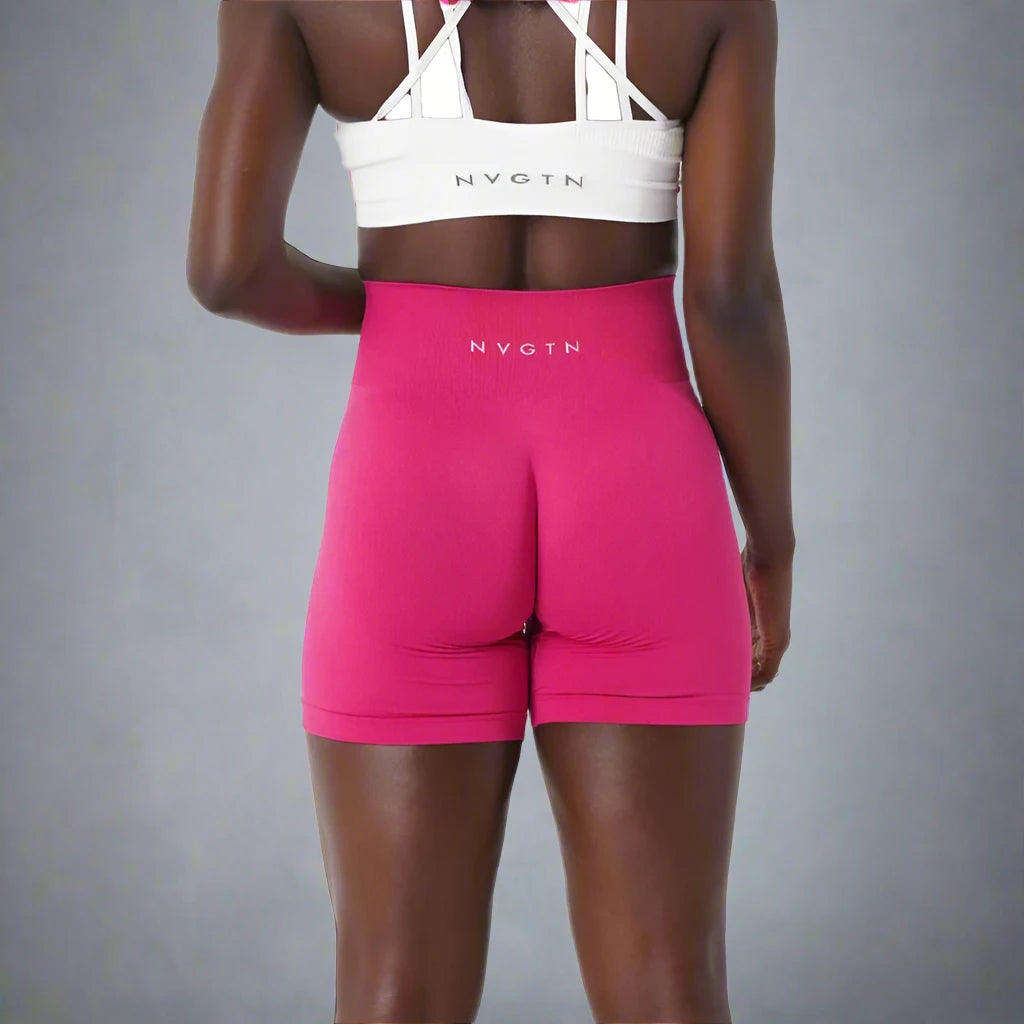 These pink high-waisted fitness shorts offer a supportive, seamless design perfect for workouts. Their stretchy material ensures comfort and freedom of movement during any activity.