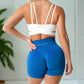 These blue high-waisted fitness shorts offer a seamless, supportive fit with stretchy fabric, ensuring maximum comfort and movement during workouts or daily activities.